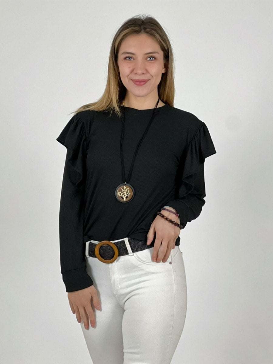 Enigmática Polera manga larga vuelos